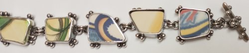 Judy Larson's Broken  AKA Bits and Pieces Dish Jewelry - , Metalwork, Filing, Finishing, Tumbling, Tumble, Tumbling Jewelry, Butane Torch, Soldering, Solder, Design, set the pottery shards into the bezels